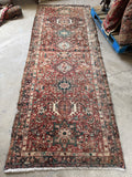 Vintage Northwest Persian hallway runner with geometric medallion design and vegetable dyed wool.