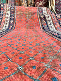 Low-profile antique Persian runner-style rug measuring approximately 5' x 9' for quiet, low-traffic spaces.
