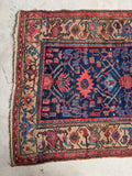 Collectible antique Kurdish rug with camel borders.