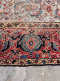 Antique designer runner featuring classic tribal motifs and a wide border band.