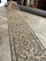 Long and narrow Persian rug from the 1920s.