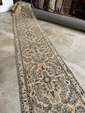 Long and narrow Persian rug from the 1920s.