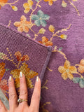 Underside of Small Chinese Art Deco rug with rich purple tones.