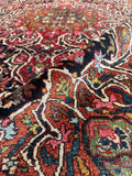 Authentic 1920s Persian Bakhtiari rug with dense weave, low pile and vegetable dyed wool.