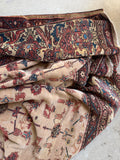 Hand-knotted Sultanabad rug featuring vegetable-dyed wool with a floppy handle.