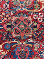 Decorative Persian Mahal rug with vibrant color scheme.
