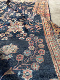 Handwoven Persian Mahal rug from circa 1910 with floppy handle.