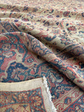 Antique Village Mahal carpet. Hand knotted Persian rug with warm ivory field, floral Herati pattern, and a relaxed floppy handle.