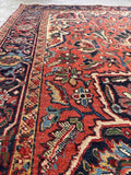 Rustic living room Heriz runner rug showing the entire balanced layout and framing borders.