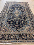 Antique Persian Kashan area rug with hand knotted vegetable dyed wool and elegant floral design.