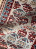 Close-up of boteh paisleys with water motif in a Persian Mahal runner.