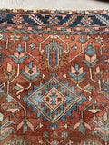 Old world Heriz rug with symmetrical medallion and floral spray