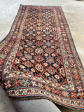 Full overhead view of Veramin rug with navy to space blue ground