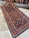 Full image of Veramin rug displaying symmetrical Mina Khani design