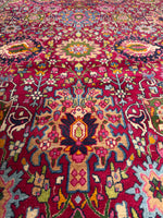 Fine vine work on antique Persian rug from Iran