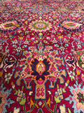 Fine vine work on antique Persian rug from Iran