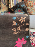 Vintage Art Deco Chinese rug rolled view showing thick pile and sheen
