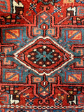 Close-up wool pile texture, antique vegetable-dyed Persian Heriz rug

