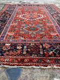 Field pattern detail, antique Persian tribal rug with geometric motifs
