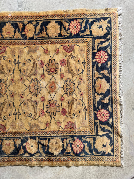 Vintage Turkish Rug with Warm Camel Field and Floral Vine Design