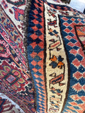 Nomadic Persian Kurdish bag face rug ivory border floral vine detail
