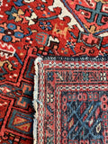Antique Persian tribal rug pile and back detail showing hand-knotted construction
