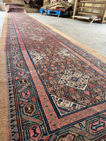 Long 20-foot Persian runner handwoven with vegetable dyed wool.