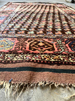 small handmade wool rug