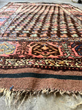 small handmade wool rug
