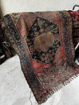 small Persian wool rug