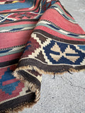 Vintage Turkish kilim rug without border bands featuring bold horizontal patterned stripes.