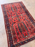 High traffic durable rug crafted from thick natural wool yarns in bright watermelon red.   