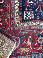 Underside of Heriz rug showing fine handwoven construction.