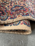 Detailed close up of Karastan runner 21 ft 5 in x 35 in showing wool pile and fine design work.