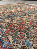 Antique Persian area rug, vintage Bidjar Iron Rug with geometric floral star motifs, vegetable dyed wool, and a beautifully worn low pile.
