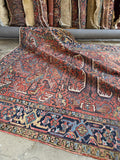 Large antique Persian rug. Vintage Heriz wool carpet with naturally aged vegetable dyes, geometric motifs, and exceptional everyday durability.
