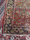 Late 19th century Persian Mahal rug with botanical pattern, hand knotted wool and rare square shape.