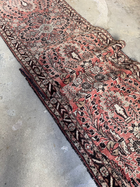 Vintage 1930s Persian runner with floral sprays and paisley border.