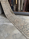 Extra long vintage runner with harmonious floral design.