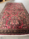 Romantic vibe Persian rug featuring floral sprays.