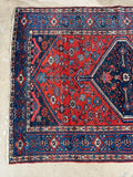 Old Persian Malayer rug with durable low pile and colorful village artistry, ideal for high traffic spaces.