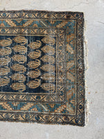 One end view of an elegant, weathered runner perfect for long hallways or open spaces.