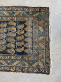 One end view of an elegant, weathered runner perfect for long hallways or open spaces.