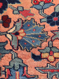 Vintage hand woven Heriz rug close up  shot showing authentic coarse Northwest Persian weave structure and color story.
