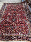 Full rug layout showing repeating angular motifs and balanced composition.