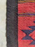 Close up of vintage Anatolian kilim rug with sturdy flatwoven construction and strong geometric tribal energy.