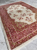 Mid-century Turkish rug in 3'6 x 5' size with low pile and a heavy, durable wool construction.