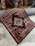 small antique Persian rug