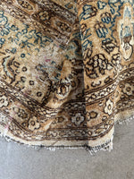 Handwoven wool texture of the Lavar Kerman rug.