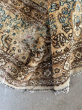 Handwoven wool texture of the Lavar Kerman rug.